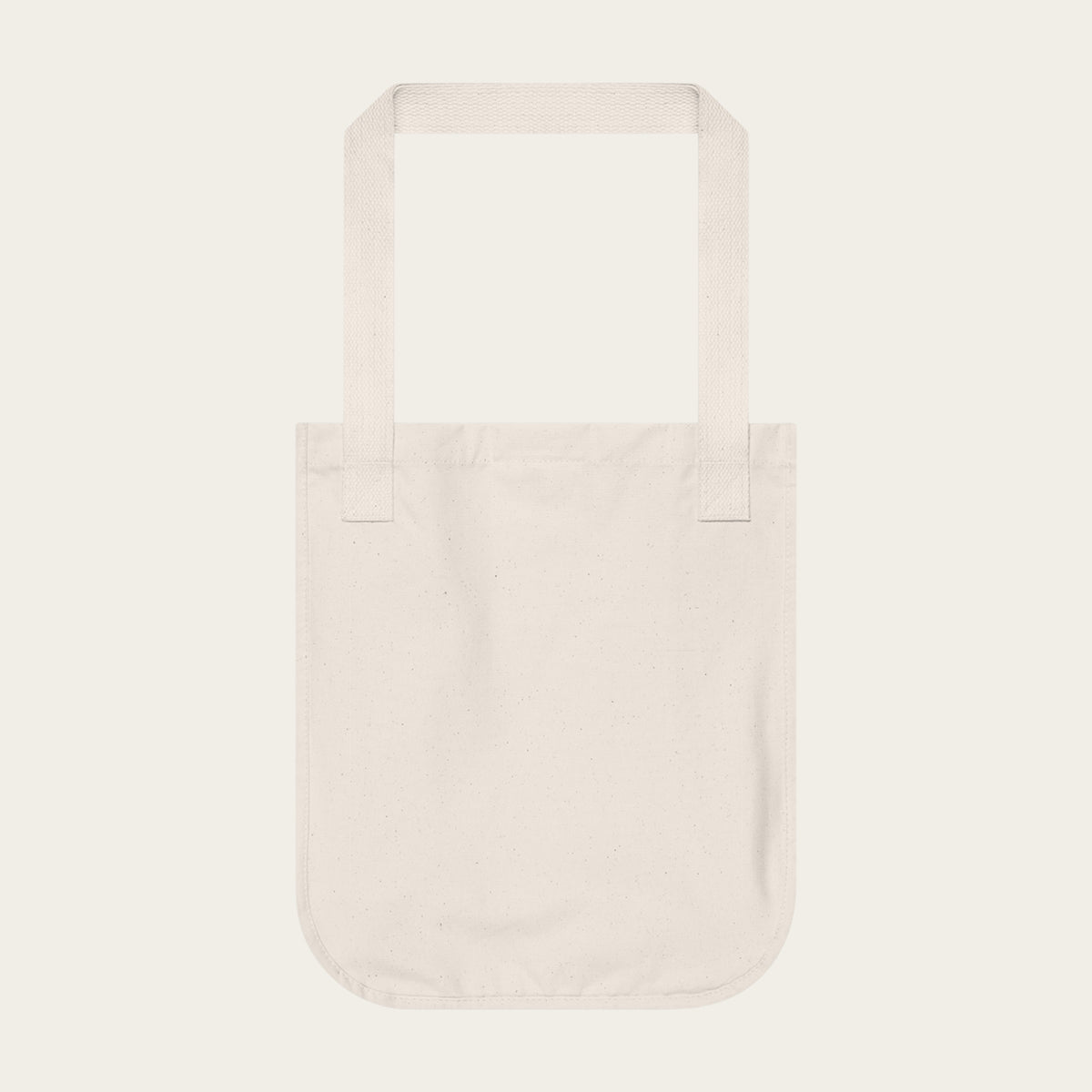 Natural canvas tote bag with wide handles, open top.
