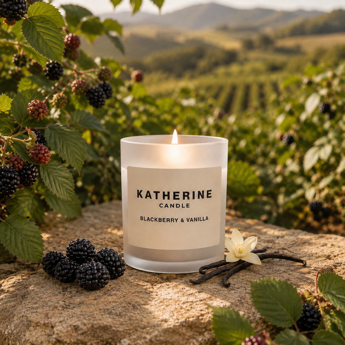 White candle jar with lit wick and KATHERINE "Blackberry & Vanilla" label