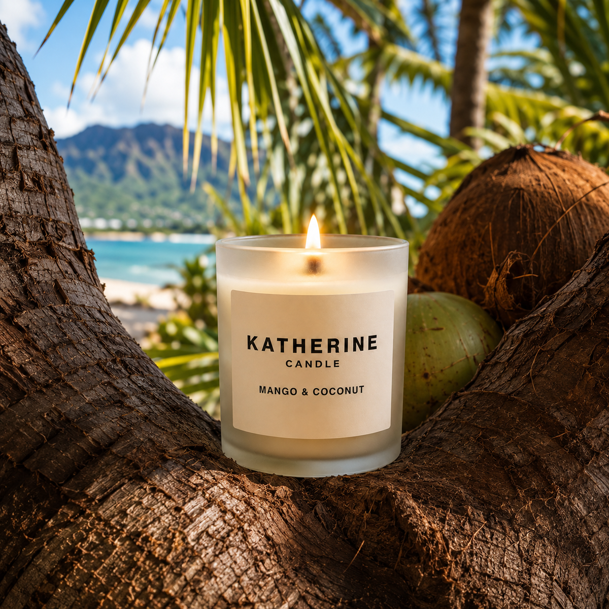 White candle in glass jar on tree bark outdoors; label reads KATHERINE CANDLE Mango & Coconut
