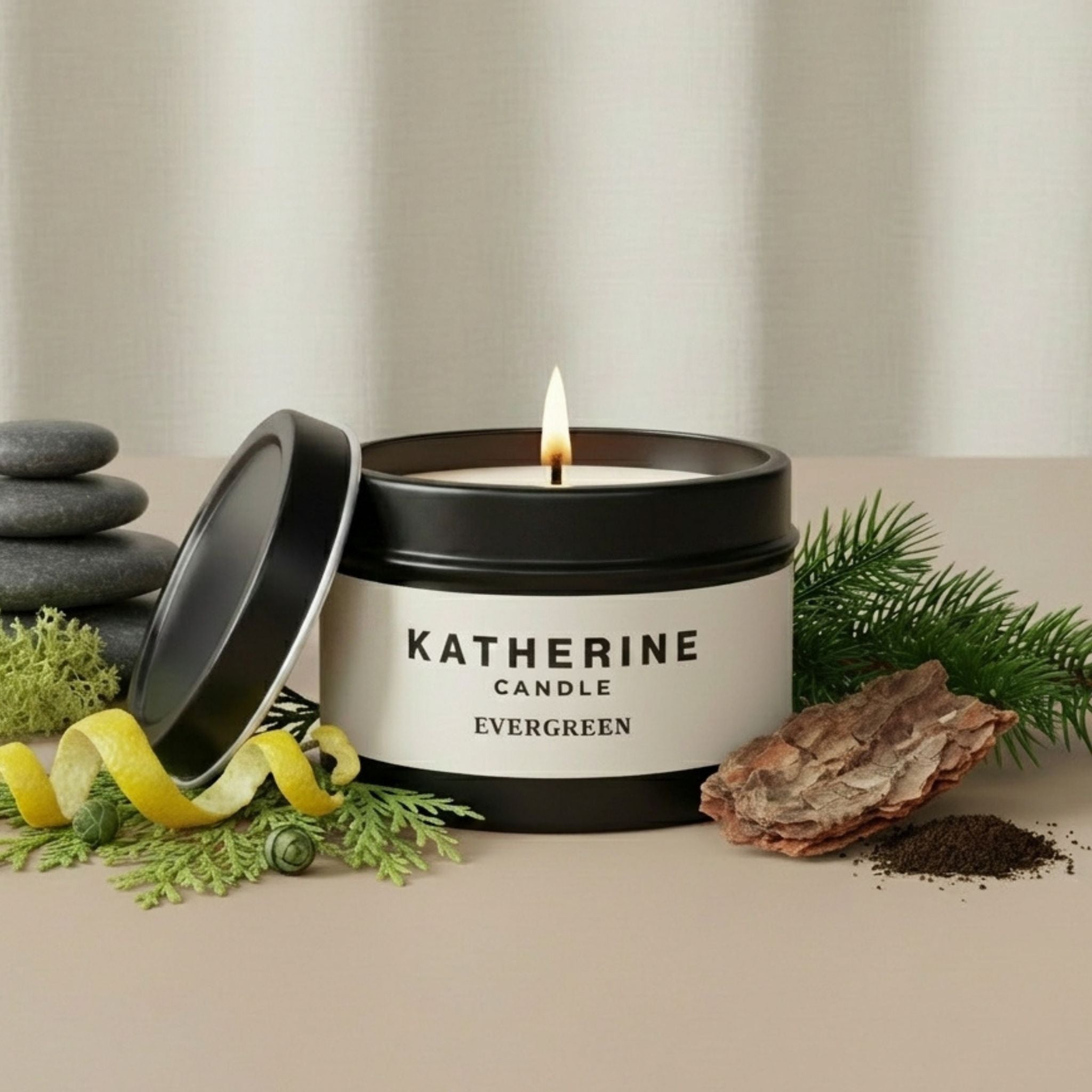 Black-lidded candle jar with flame, KATHERINE CANDLE EVERGREEN label