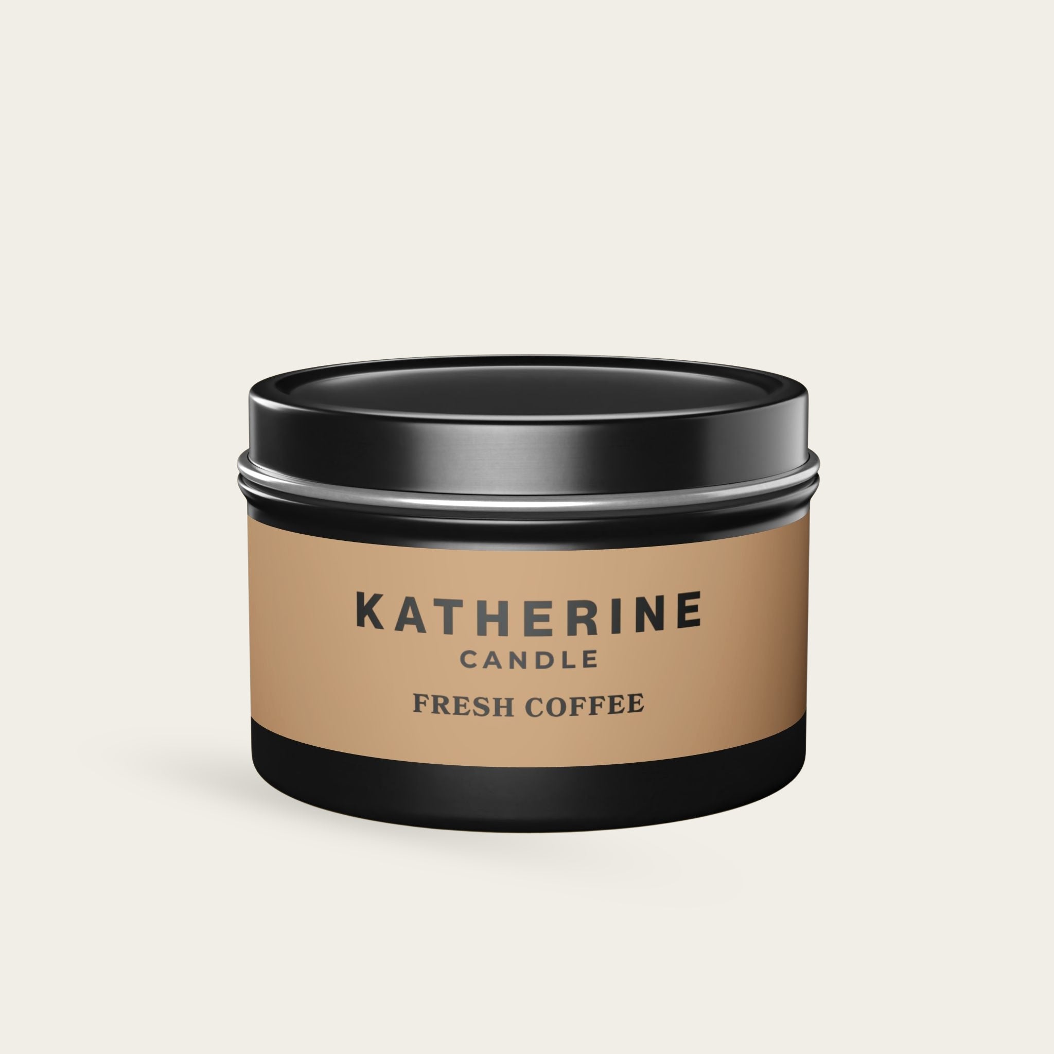 Black-lidded candle jar with beige label reading KATHERINE FRESH COFFEE