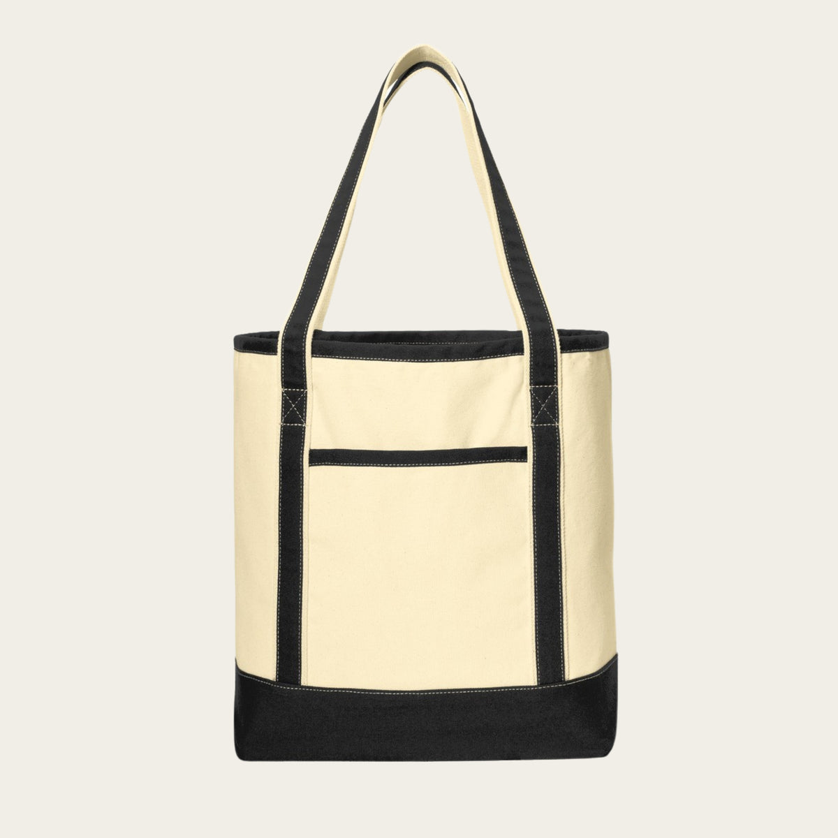 Large cotton canvas tote with cream body, black handles, base, trim, and front pocket