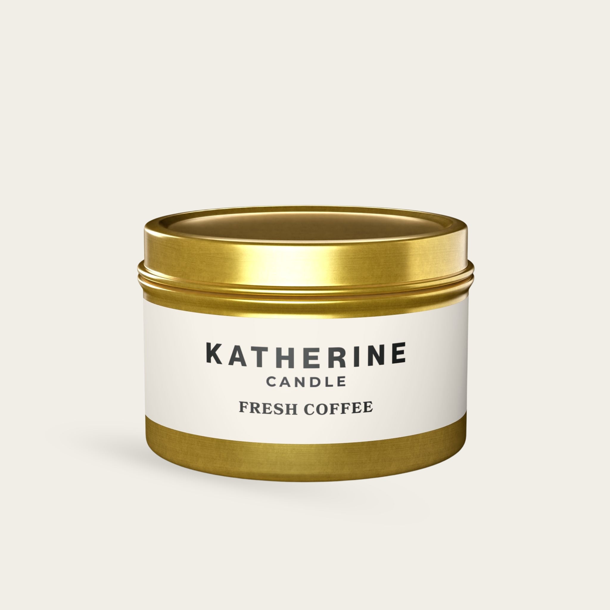 Coffee-scented candle in gold metal jar with label band and branding