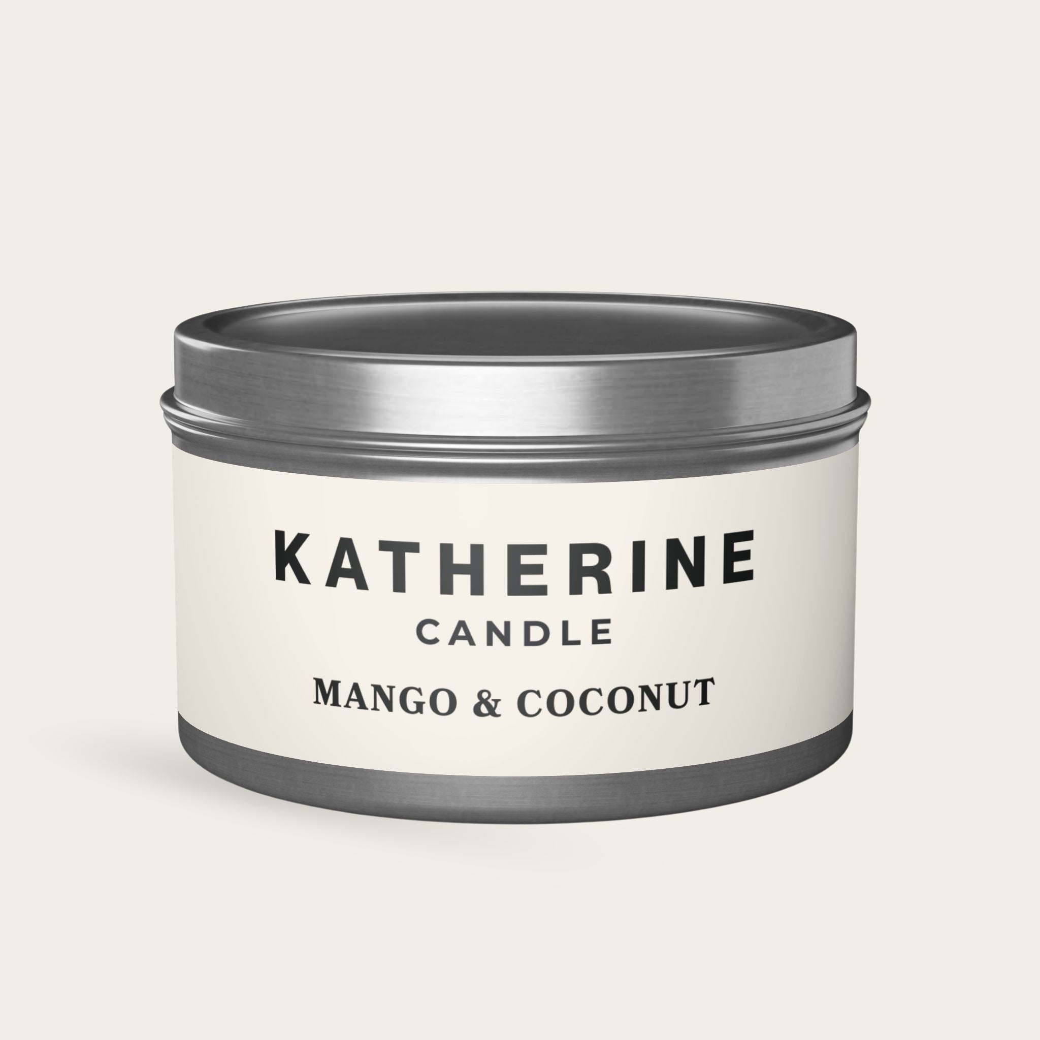 Mango & coconut candle jar with silver lid, white label and dark band, KATHERINE CANDLE