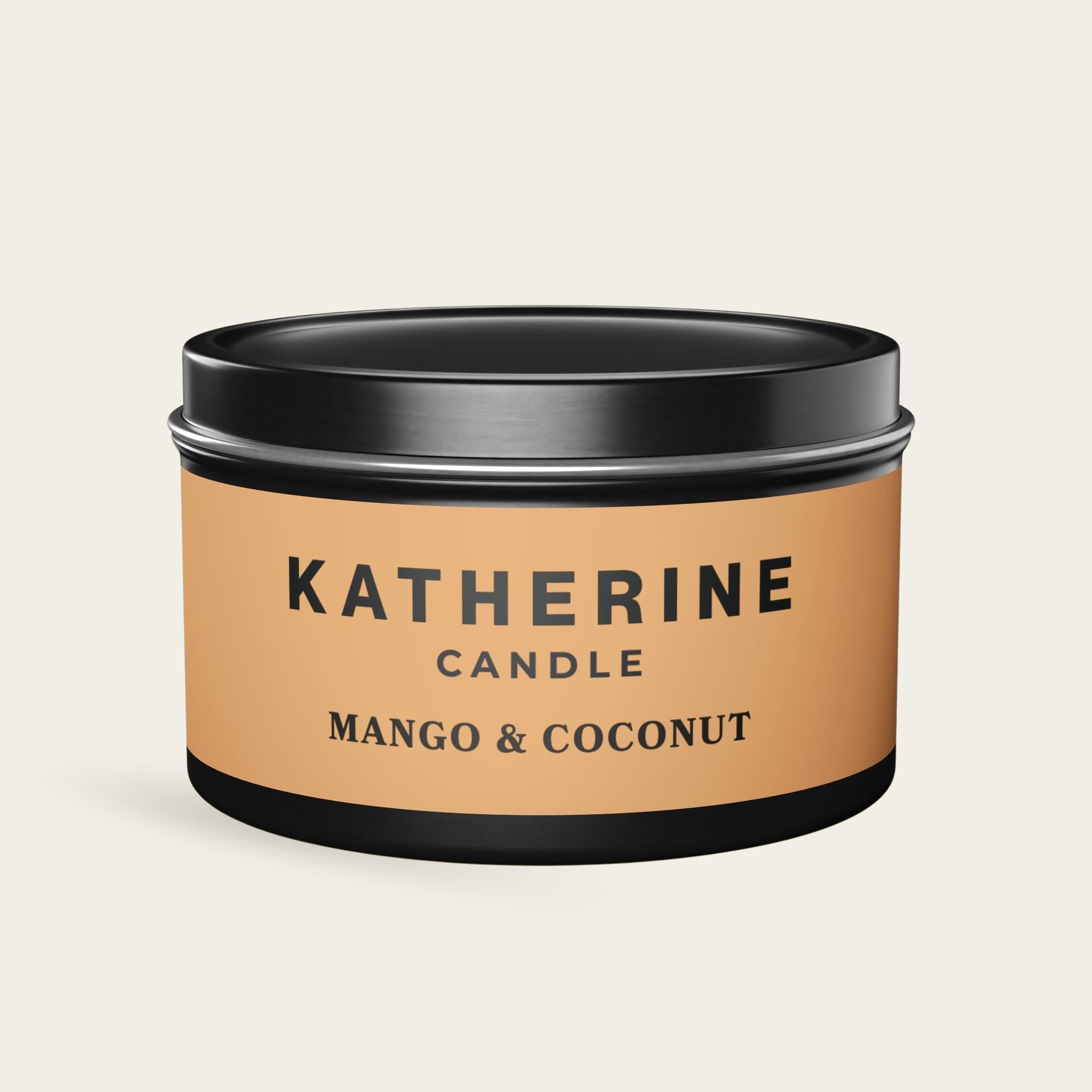 Black candle jar with black lid and Mango & Coconut label