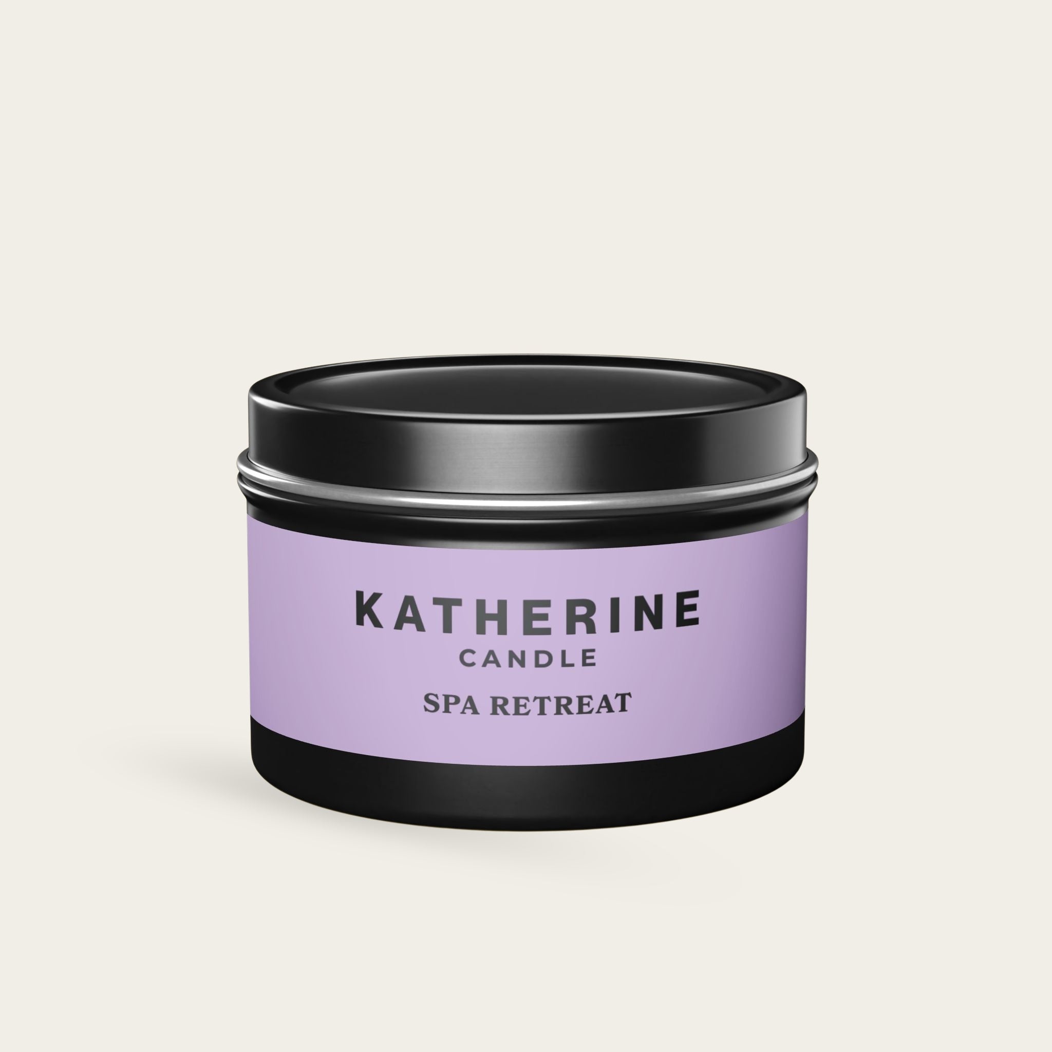 Spa Retreat candle jar with black metal lid, purple label with logo